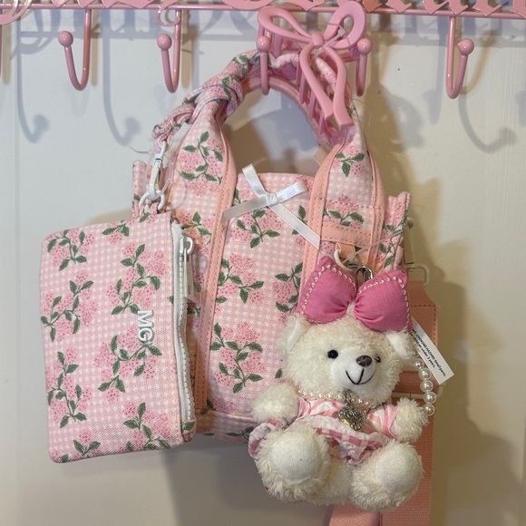 Madden Girl Handbags - Madden Girl Pink Floral Mini Tote with Bear Charm